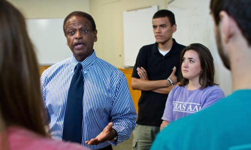 Marketing faculty member Herb Miller talking with students in class.
