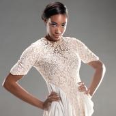 Model posing in dress.