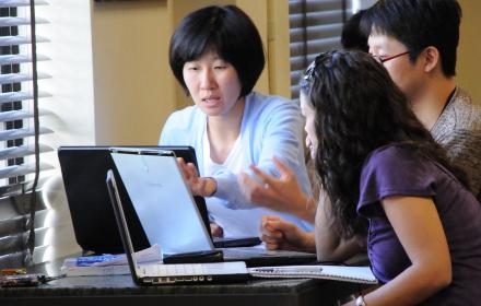 Group of students working through an assignment.
