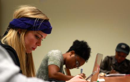 Undergraduate researchers analyzing stuttering data in Prof. Courtney Byrd’s lab